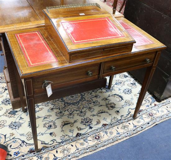 A Victorian inlaid rosewood writing desk W.91cm.